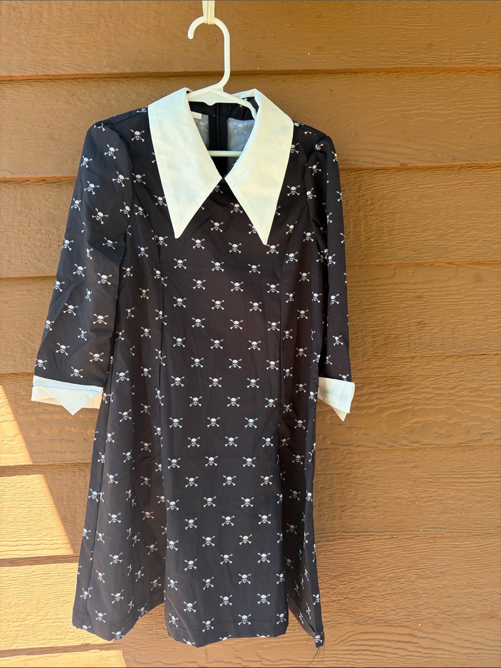 Little girl black and white skull dress, perfect for Halloween.